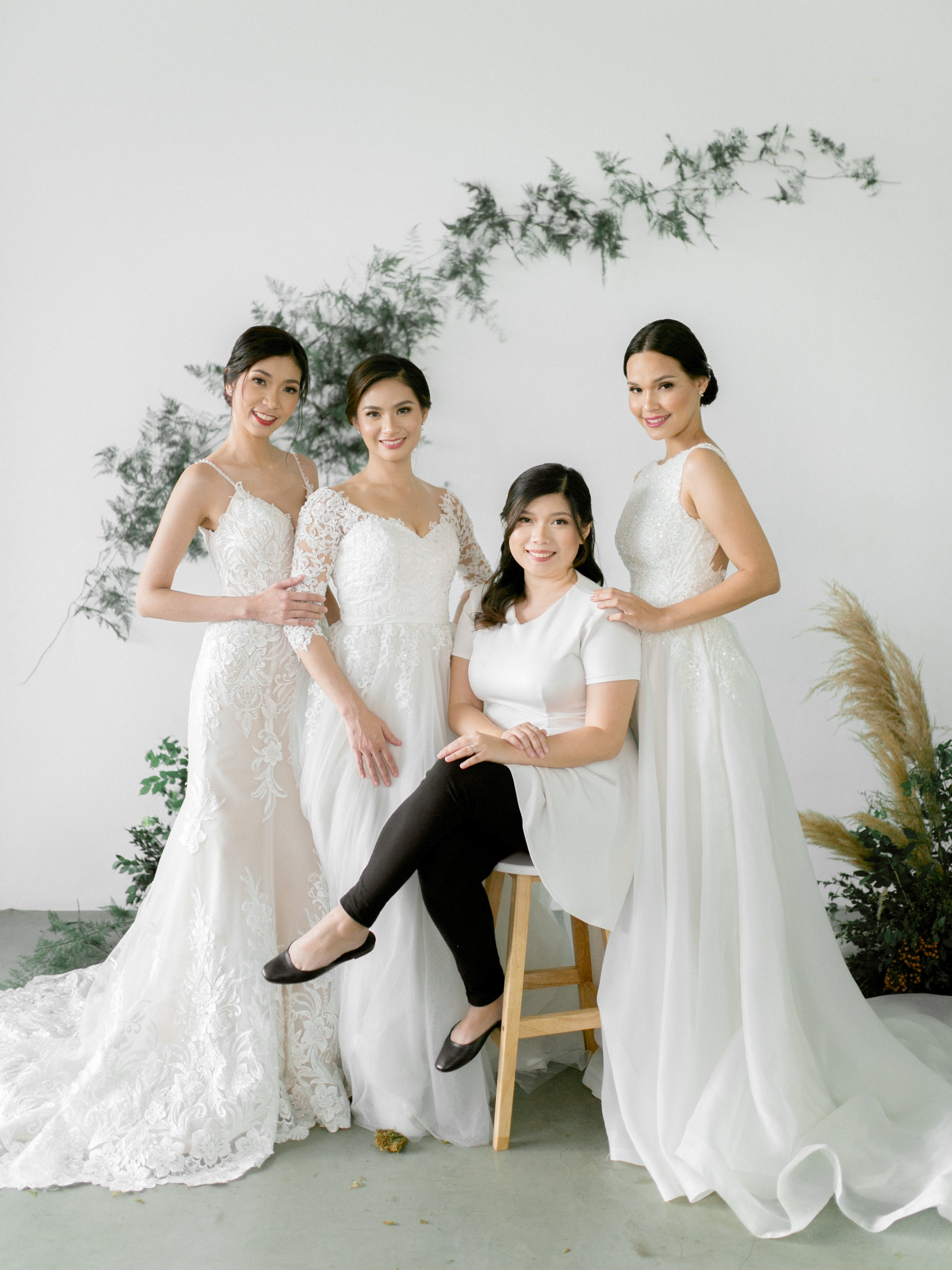 three-wedding-dress-models-with-designer